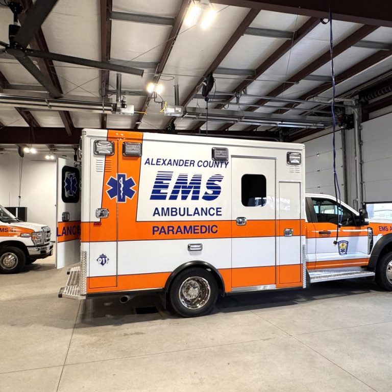 Ambulances are shown in the new garage at EMS Base 1.