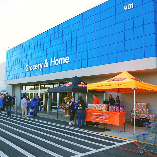 EXTERIOR REFRESHED — The Taylorsville Walmart store received a remodel, inside and out, in recent weeks. Above, several special vendors were on hand with giveaways for customers on Aug. 29, including Thomas Muffins, Frito-Lay snacks, Nature’s Own bread, Coca-Cola, and other brands.