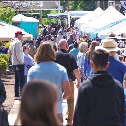 ATTENDANCE INCREASES — The Taylorsville Apple Blossom Festival has increased in attendance as word of the spring festival has spread. It was introduced in the past decade to complement the fall Apple Festival, held the third Saturday in October each year.