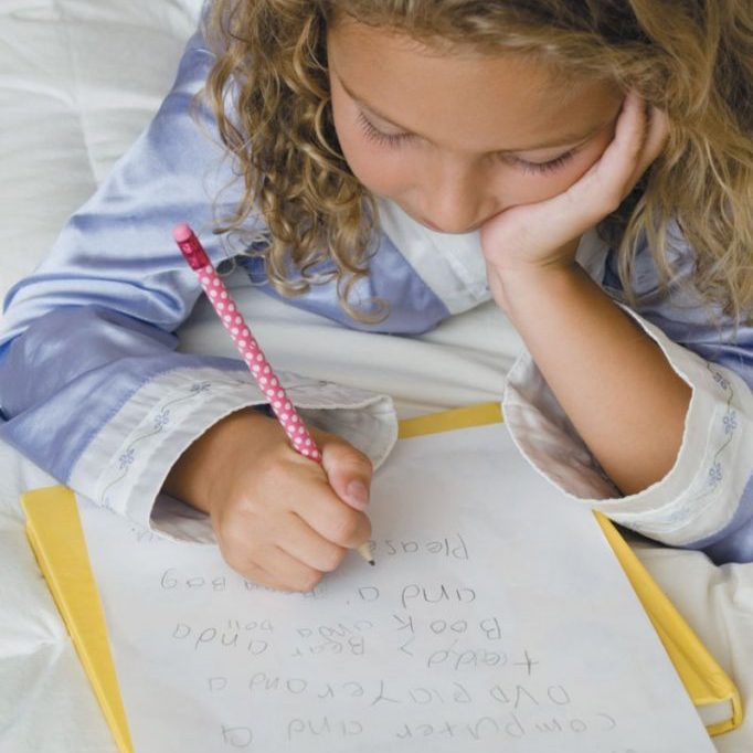kid writing N07B6650